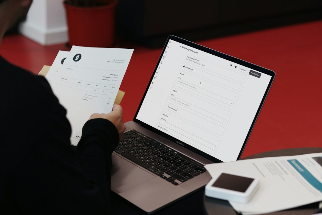 Finance professional reviewing invoices and digital document automation
