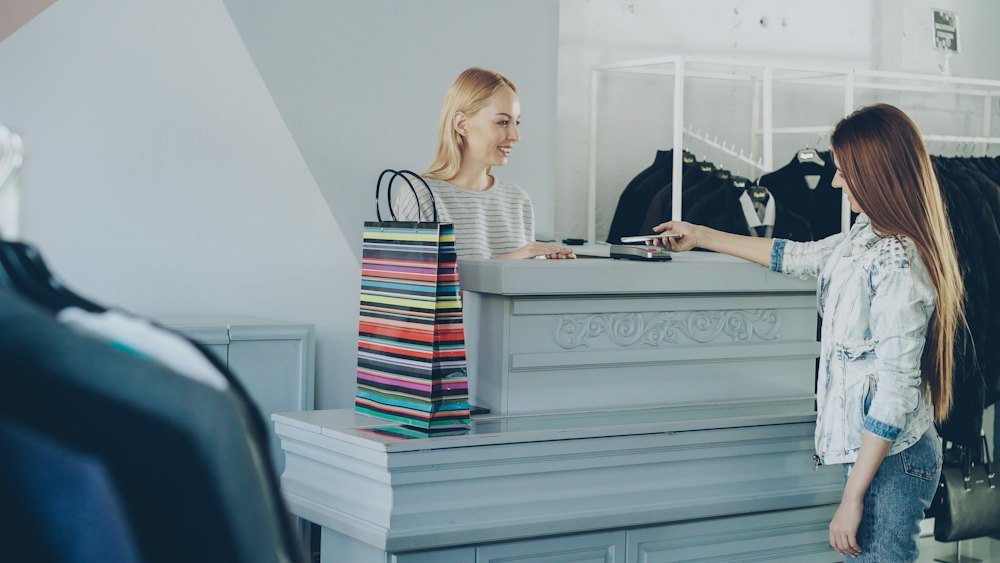 Retail checkout transaction at a clothing shop