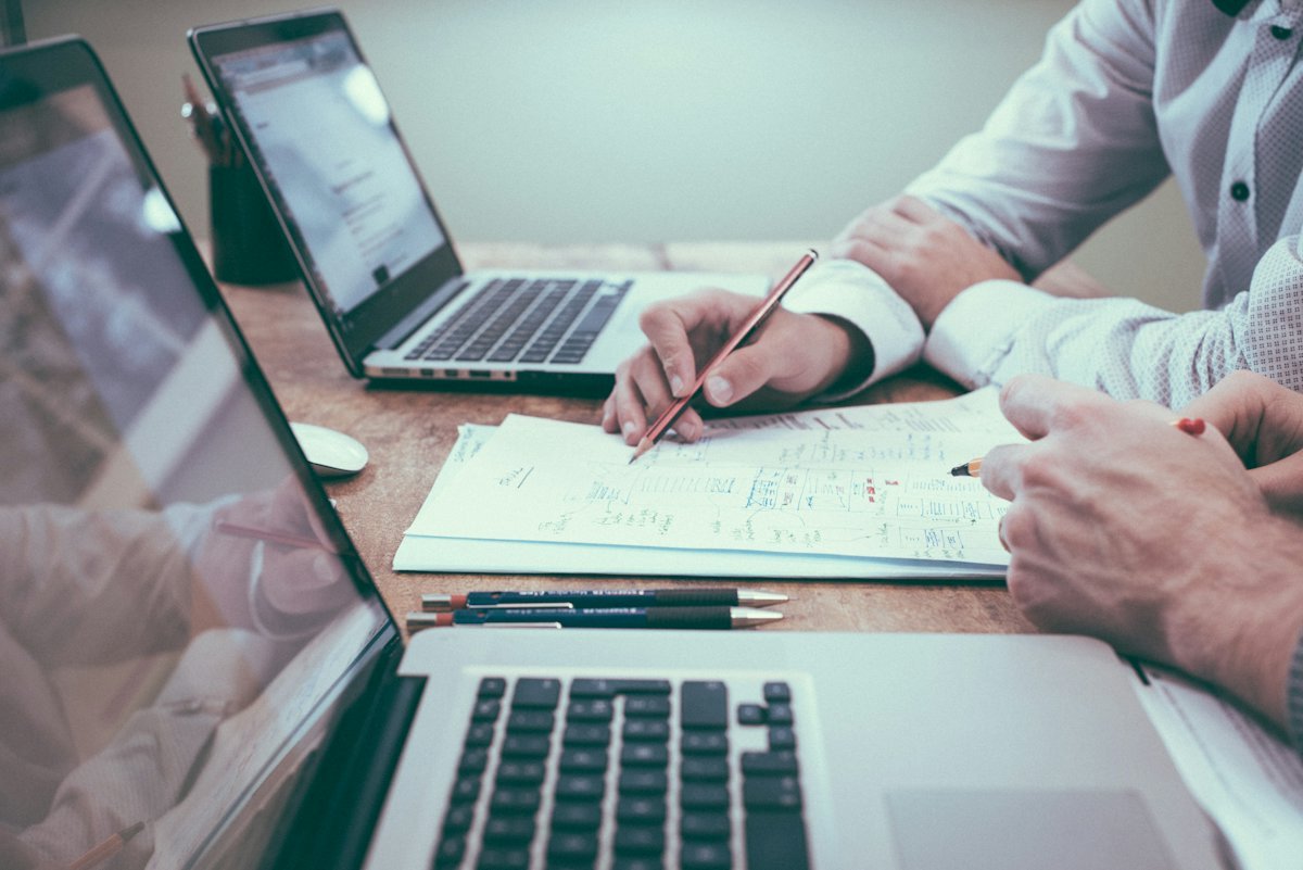 Finance team reviewing digital invoice preparation and Odoo ERP integration requirements